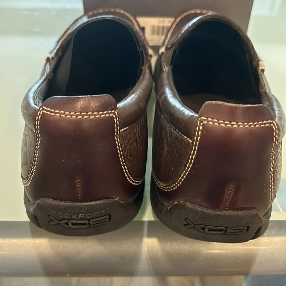 Rockport new loafers chocolate brown 9 scratches on top of right shoe see pictur